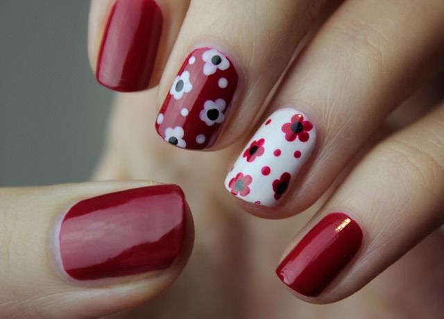 Nail trimming care specialist portrait in dark luxury grooming studio